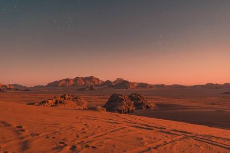 Did a Vanished Martian Moon Leave Its Mark in Ancient Tidal Seas